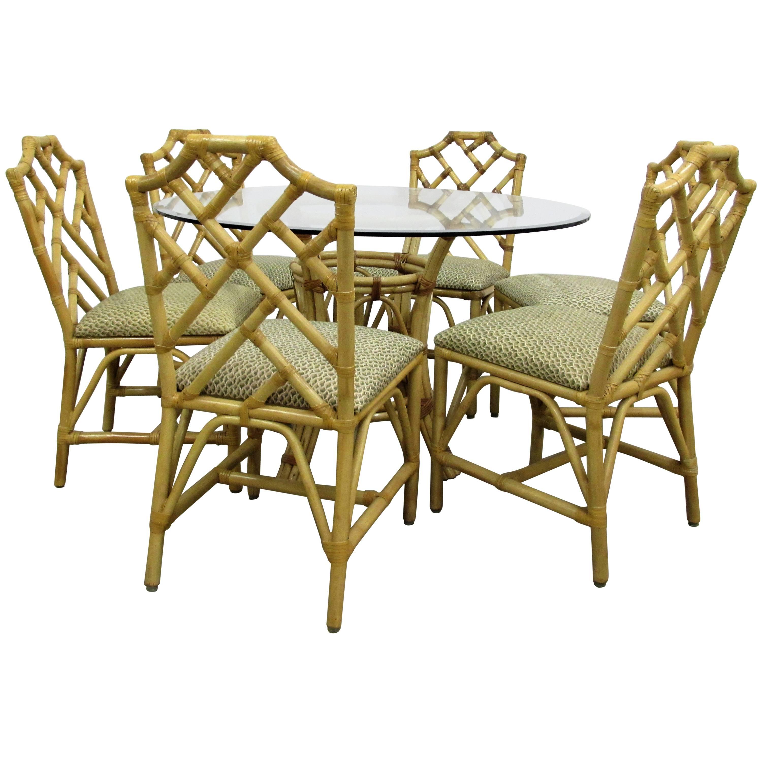 McGuire Chinese Chippendale Bamboo Rattan Chairs and Round Table, Set For Sale