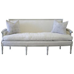 20th Century Carved Louis XVI Style Painted French Sofa Upholstered in Linen