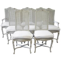20th Century Painted Louis XV Style Cane Back Dining Chairs with Linen Cushions