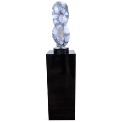 Alabaster Abstract Sculpture of a Female Torso Signed, on a Black Pedestal