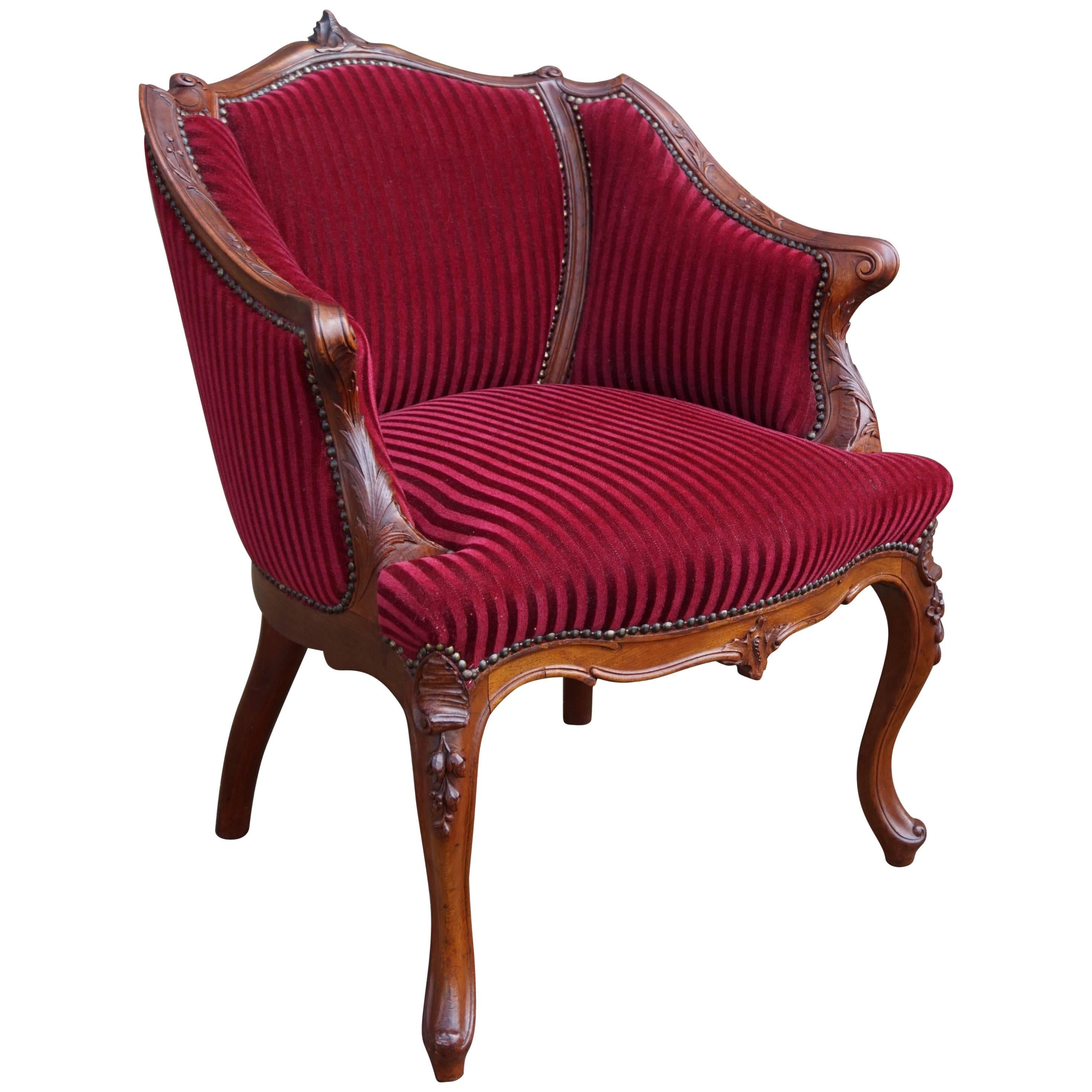 Antique and Stunning 19th Century Hand-Carved Mahogany and Red Velour Chair