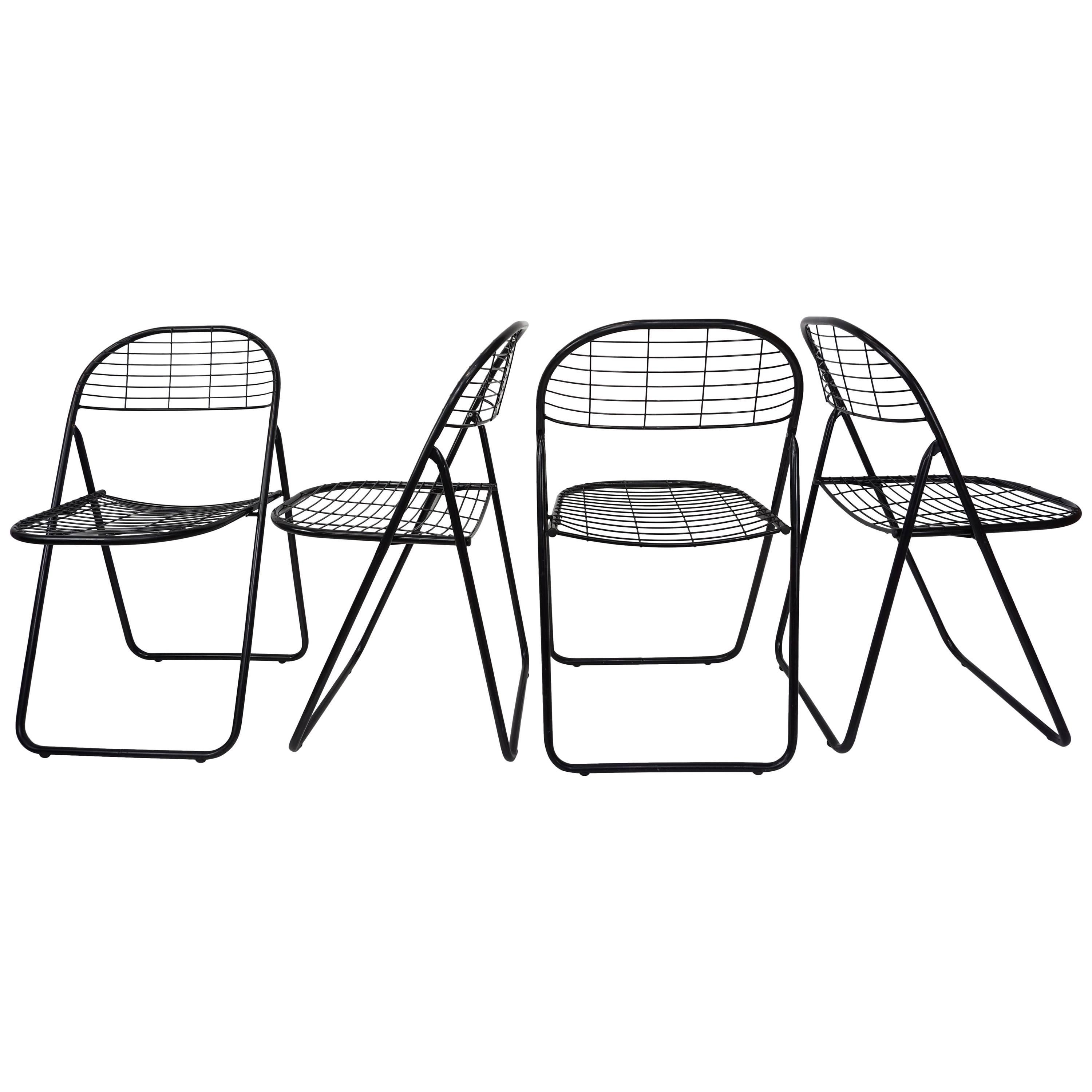 Black Metal Set of Four Folding Chairs