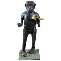 Vintage Life-Sized Folk Art Wood Monkey and Banana Carving with Glass Eyes