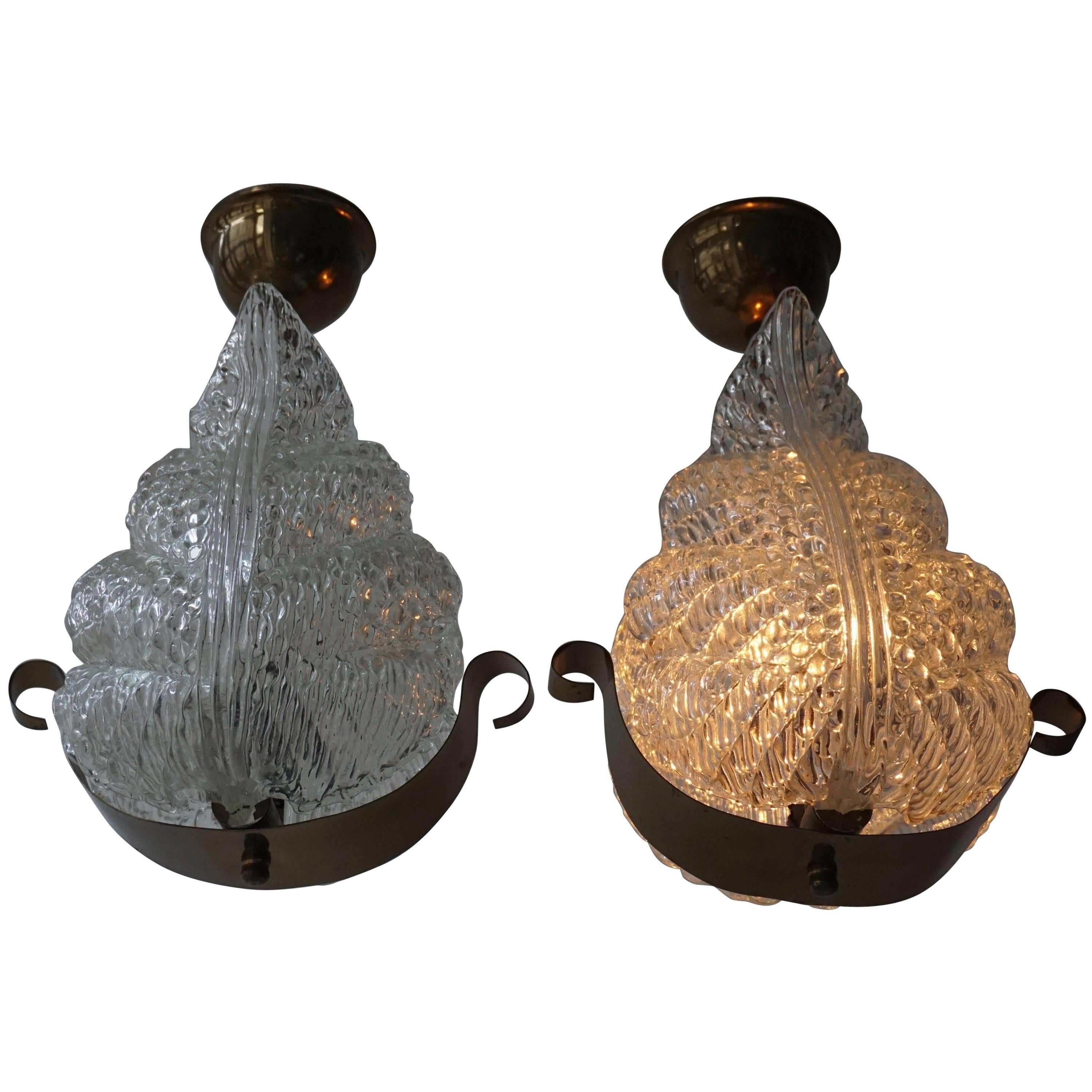One Italian Brass and Murano Glass Pendant Light.