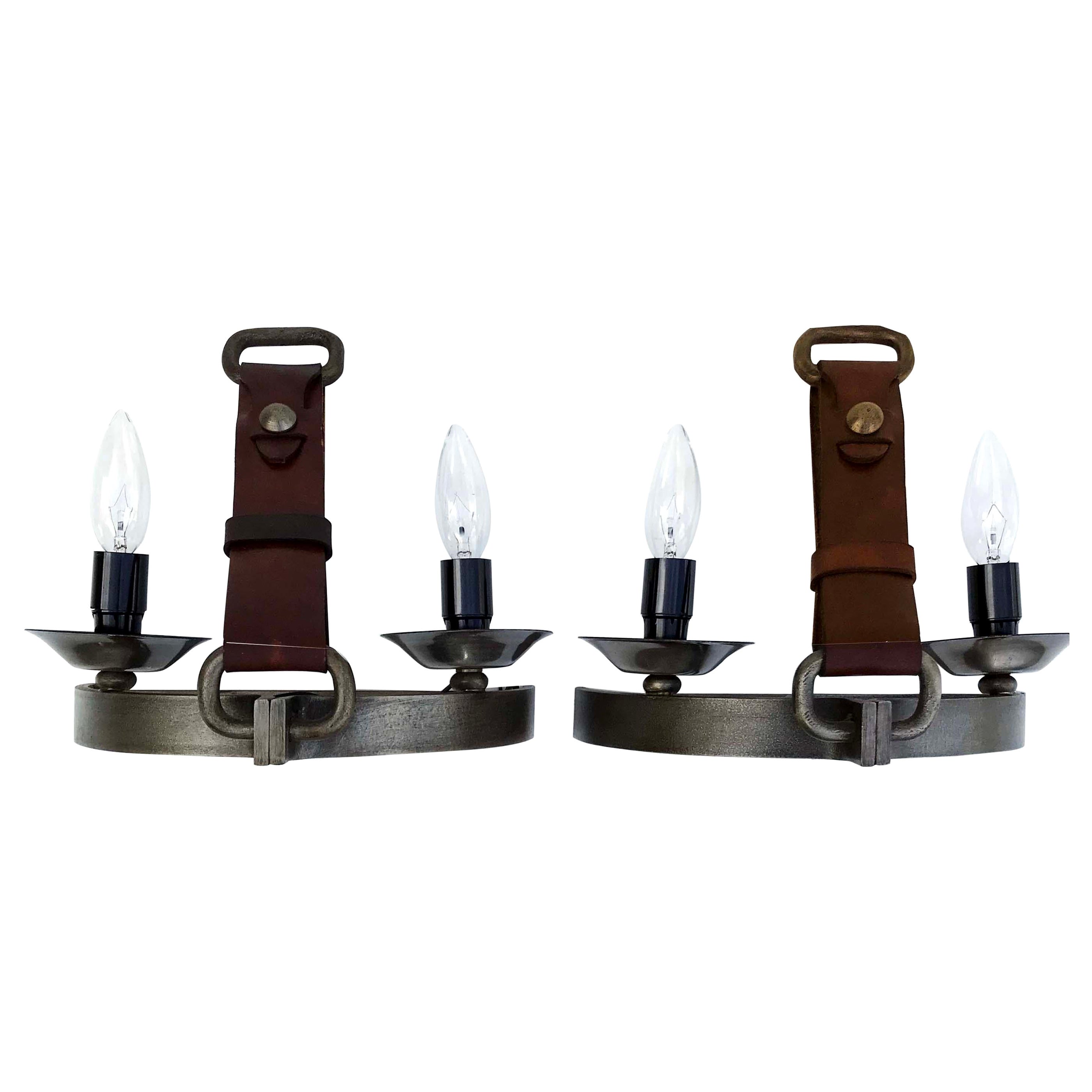 Pair of Semi Round  wrought iron and leather Jacques Adnet Style Sconces For Sale