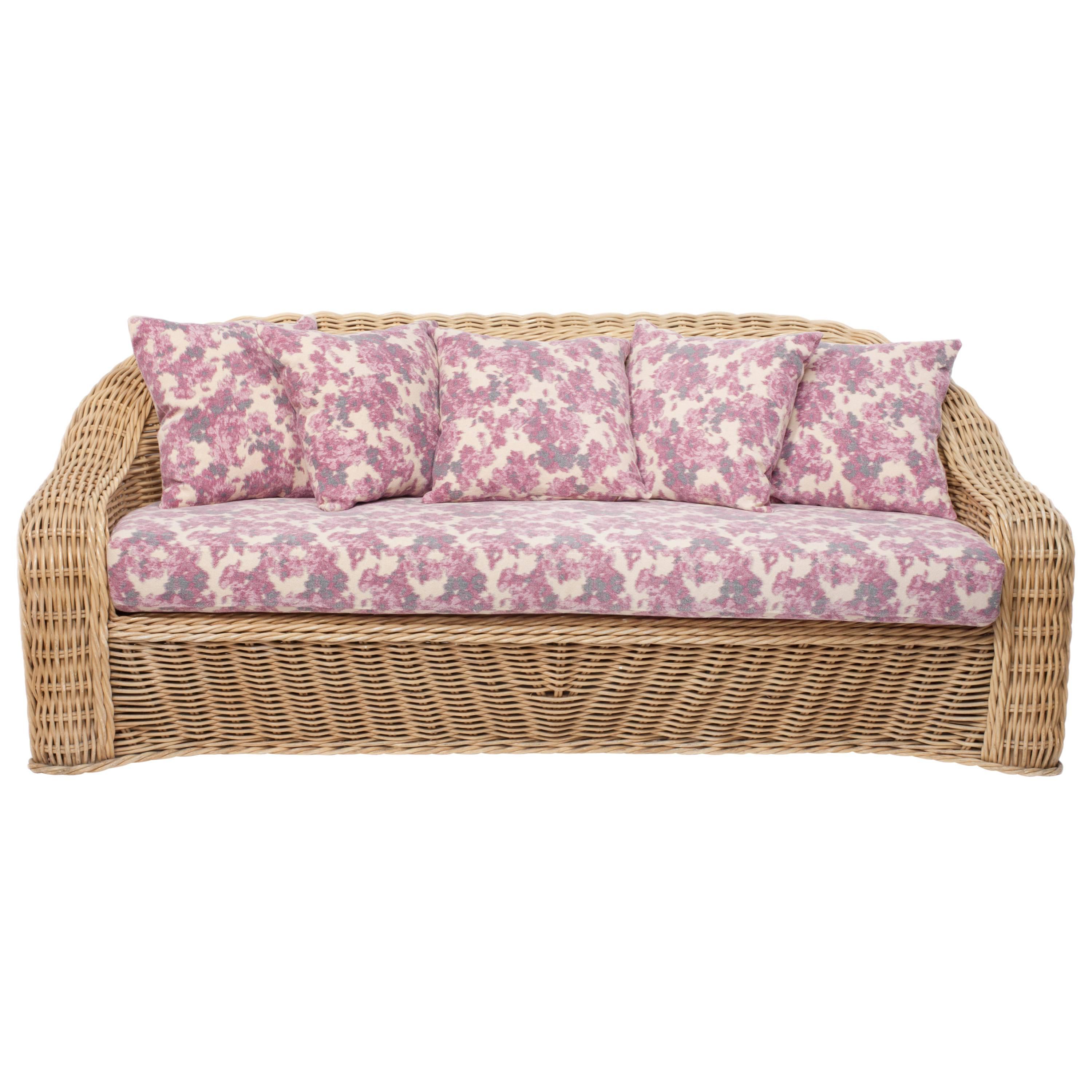 Vintage Curved Wicker Sofa Upholstered in Pink and Purple Floral Fabric