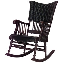 Antique American Victorian Oak & Black Tufted Leather Rocking Chair with Spindle Design