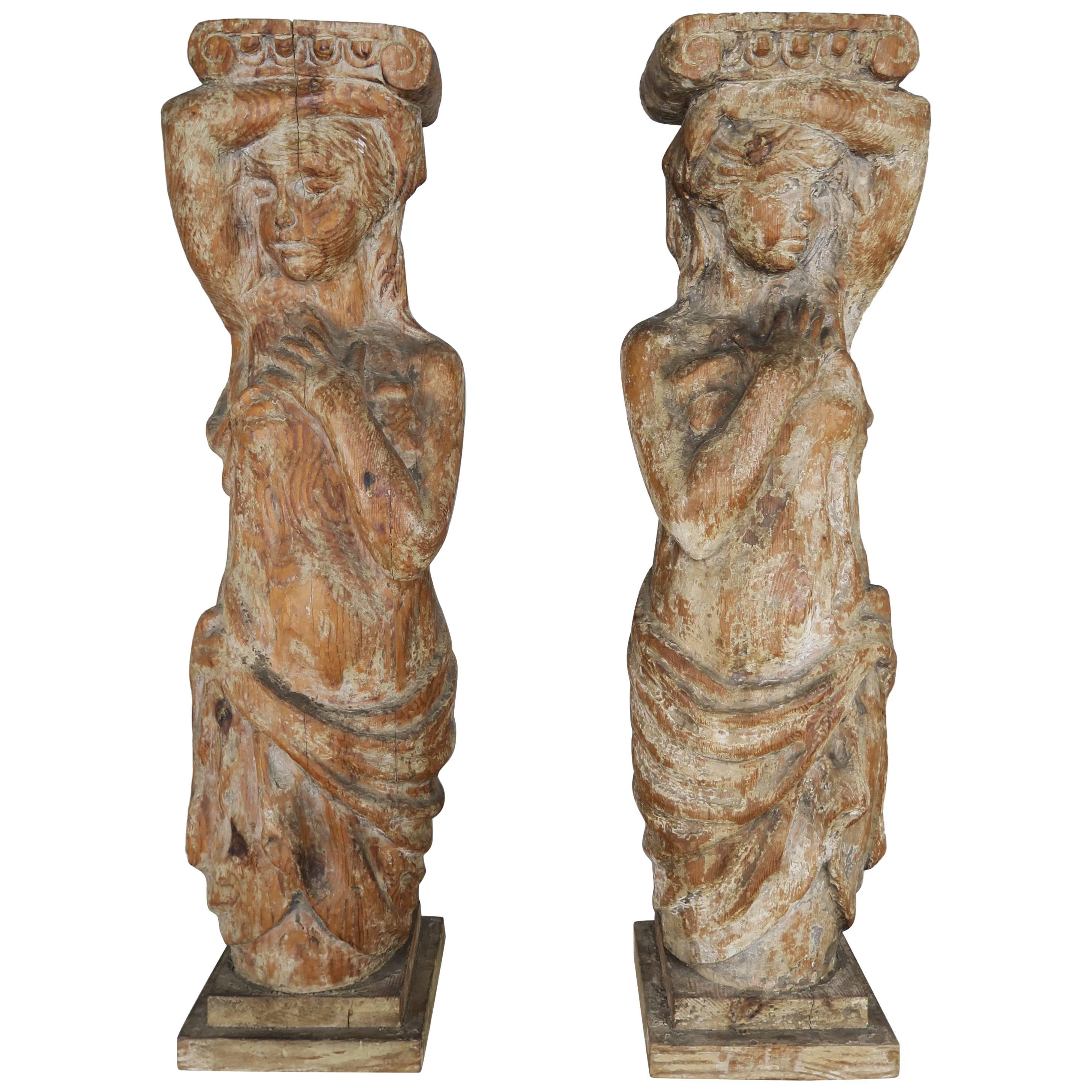 Pair of Spanish Carved Wood Figural Pedestals
