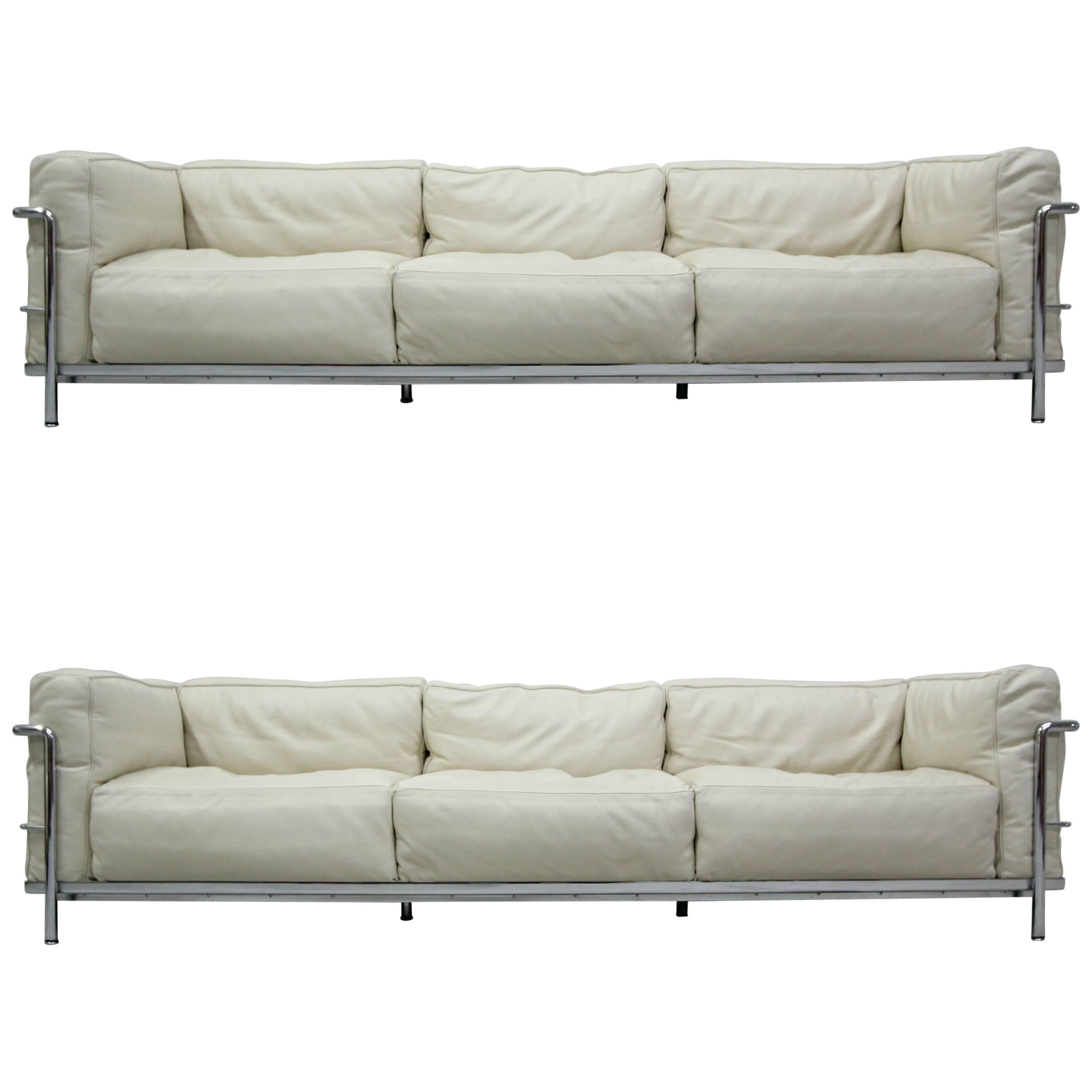 Authentic Pair of LC3 Cassina Grand Modele Three-Seat Sofas by Le Corbusier