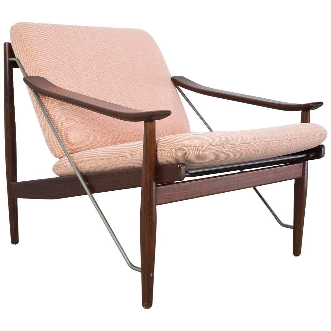 Vintage Danish Lounge Chair in Teak, Metal and New Salmon coloured fabric For Sale