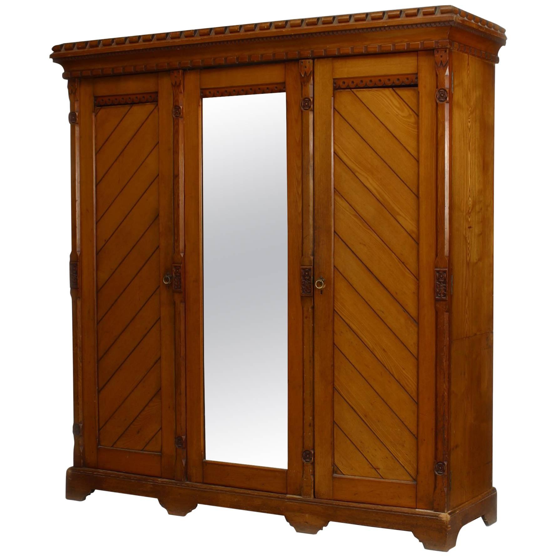 English Arts & Crafts Carved Pine Armoire For Sale