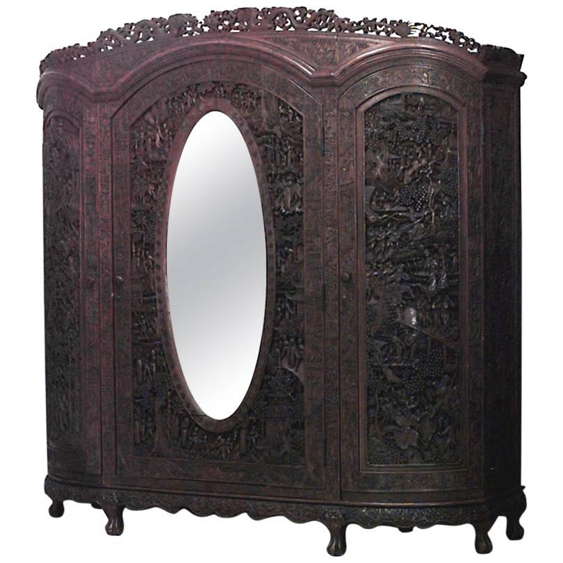 Chinese Style Carved Teakwood Armoire For Sale