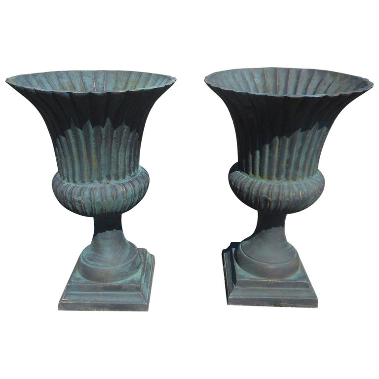 Pair of Large Cast Iron Urns For Sale at 1stdibs