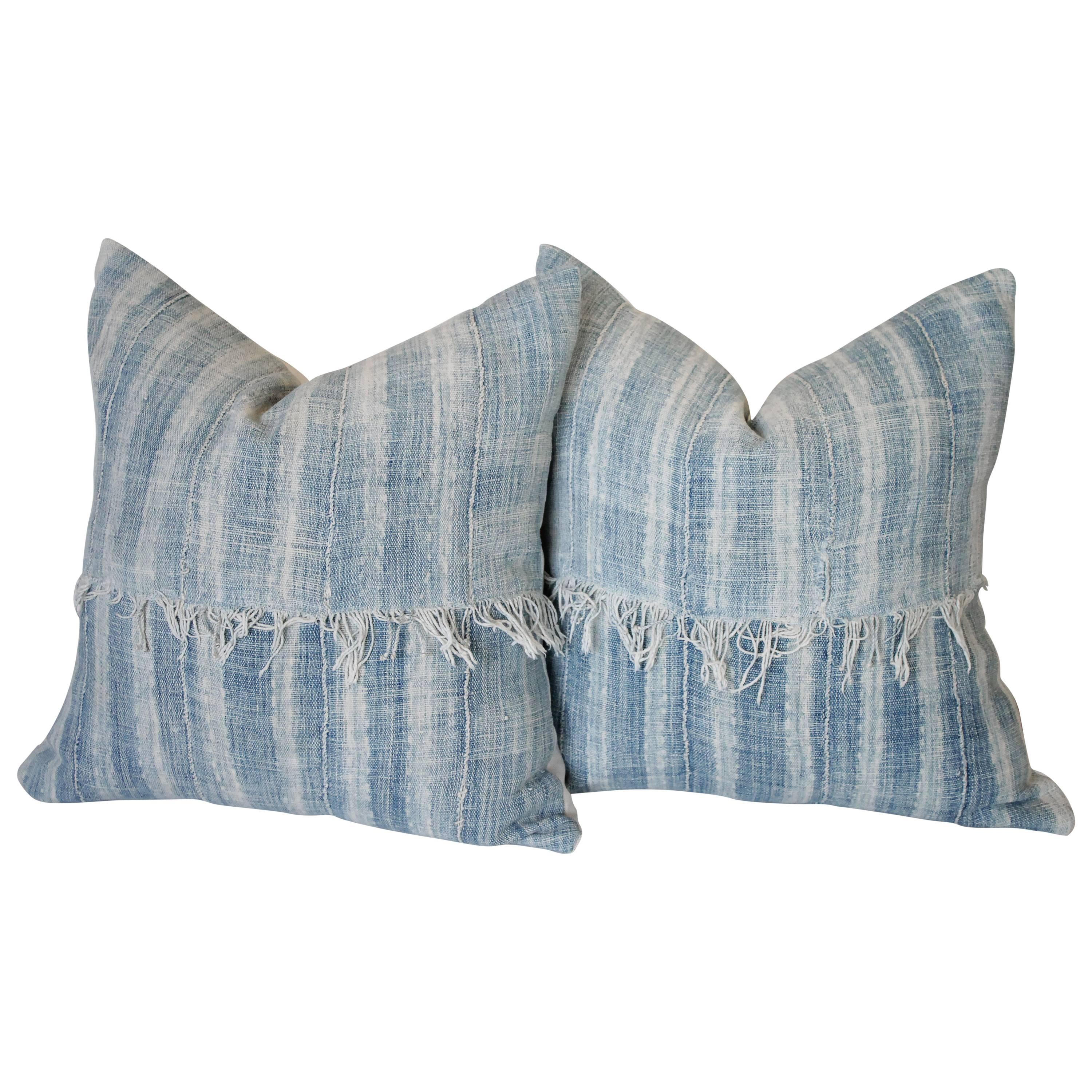 Pair of Antique Faded Blue Indigo Stripe African Mudcloth Pillows with Fringe