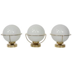 Set of Three Brass and White Opaline Ball Shape Wall Sconces