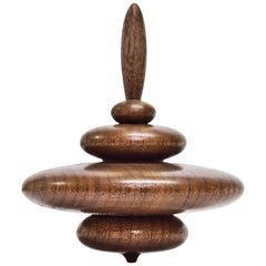Small Cairn Elemental Spinning Top in Oiled Walnut by Alvaro Uribe for Wooda