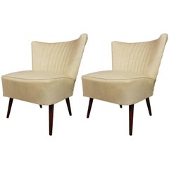 Pair of MCM Wooden Feet and Warm White Faux-Leather Cocktail Armchairs