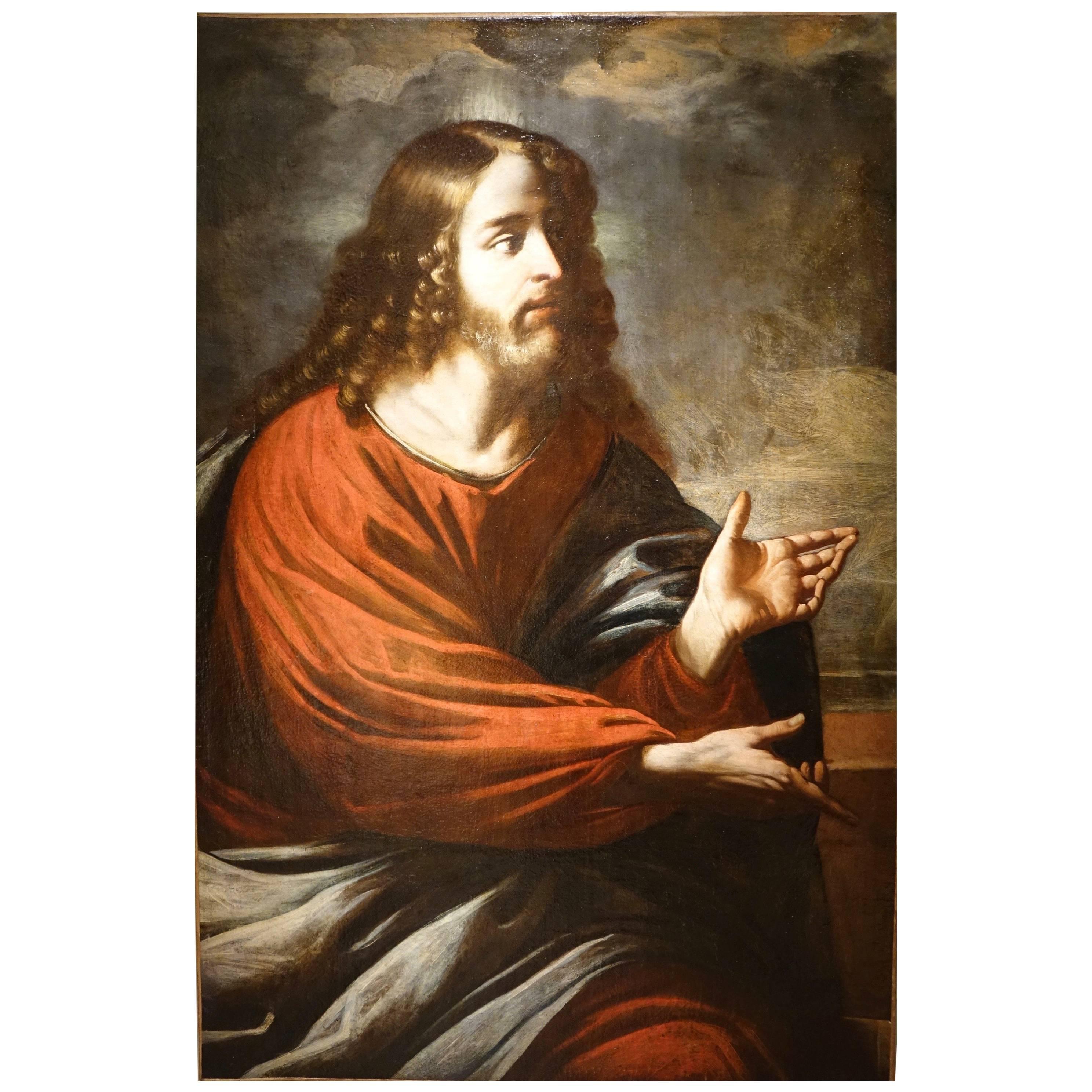 Christ preaching before a stormy, threatening sky.
Oil on canvas.School of Ferrara, in the circle of G.Francesco Barbieri, circa 1620. 
Italian School 
Beautiful 17th century frame mecca gilt wood 
He seems to be sitting, pointing his index,