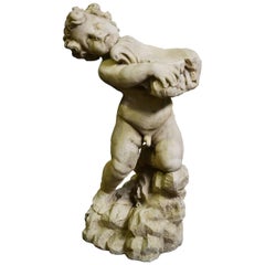 Cupid Statue Carrying a Shell