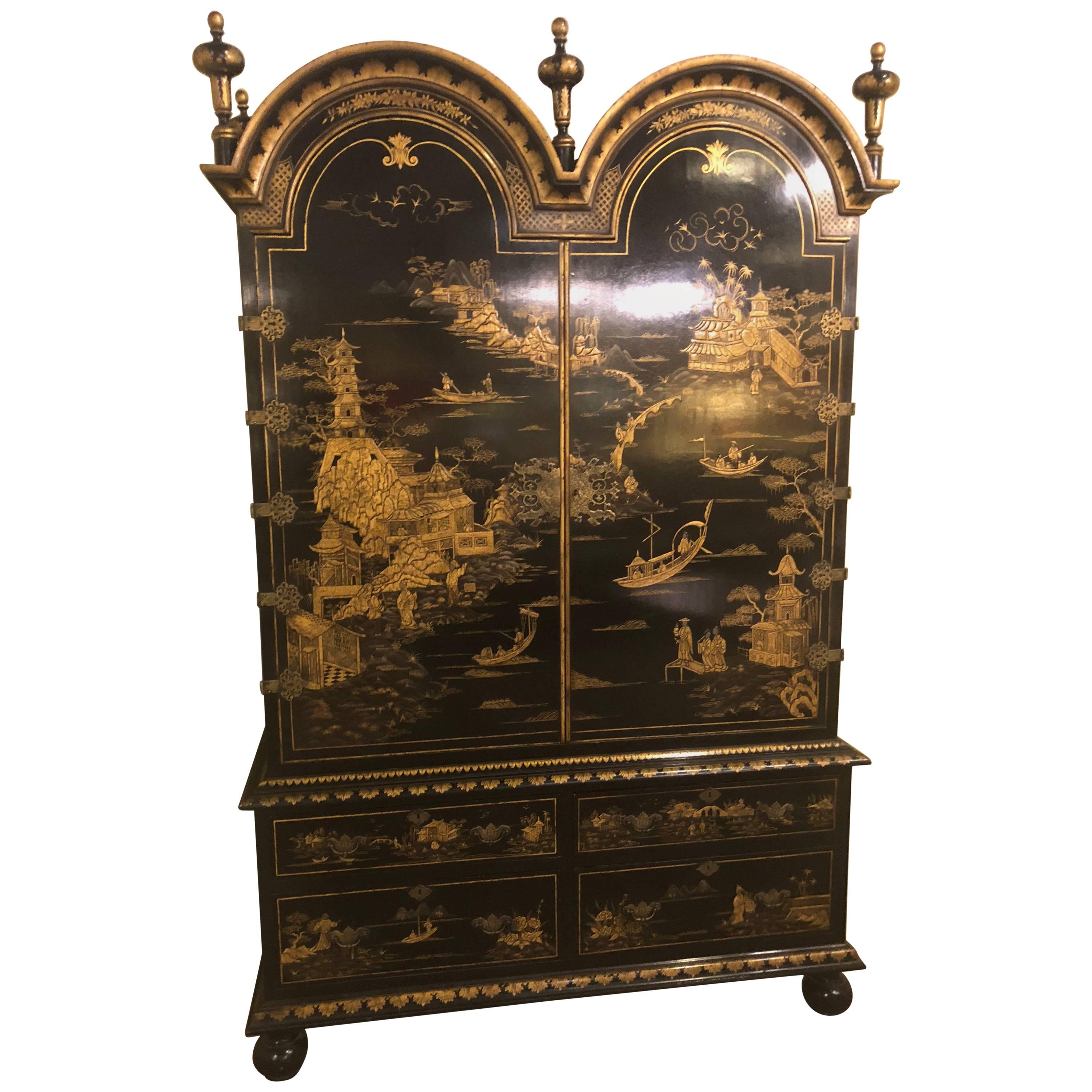Palatial Chinoiserie Decorated Ebonized Two-Door over Four Drawer Armoire