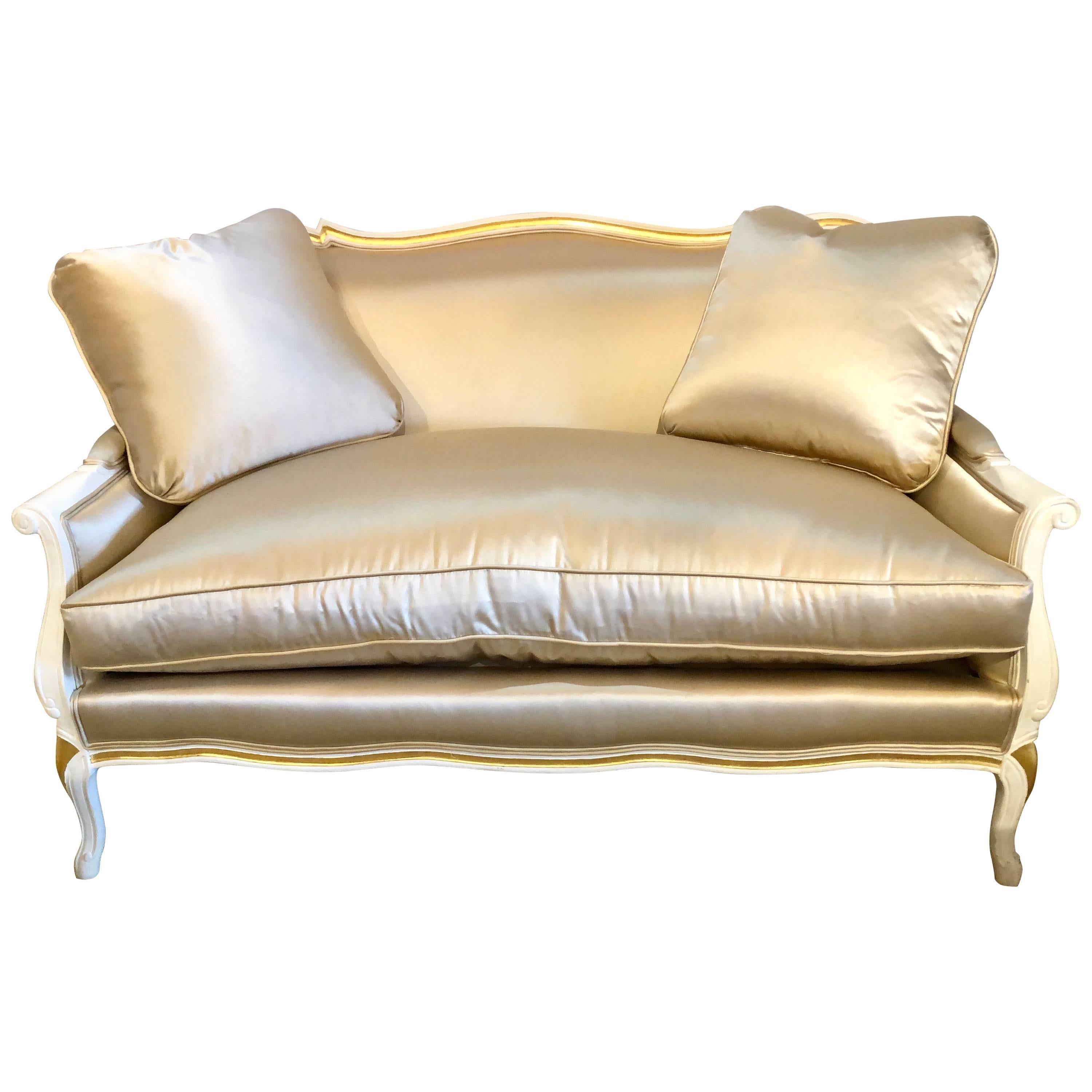 Gilt and Paint Decorated Settee / Loveseat in a Fine Satin Upholstery
