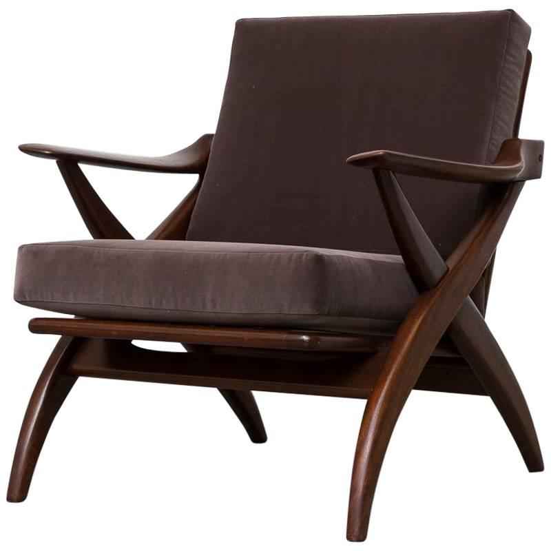 Organically Carved Low Back Teak Lounge Chair