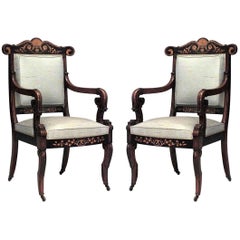 Paire de fauteuils français en bois de rose Charles X