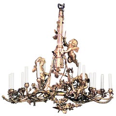 Lustre français de style Louis XVI en bronze doré représentant Cupidon et oiseaux