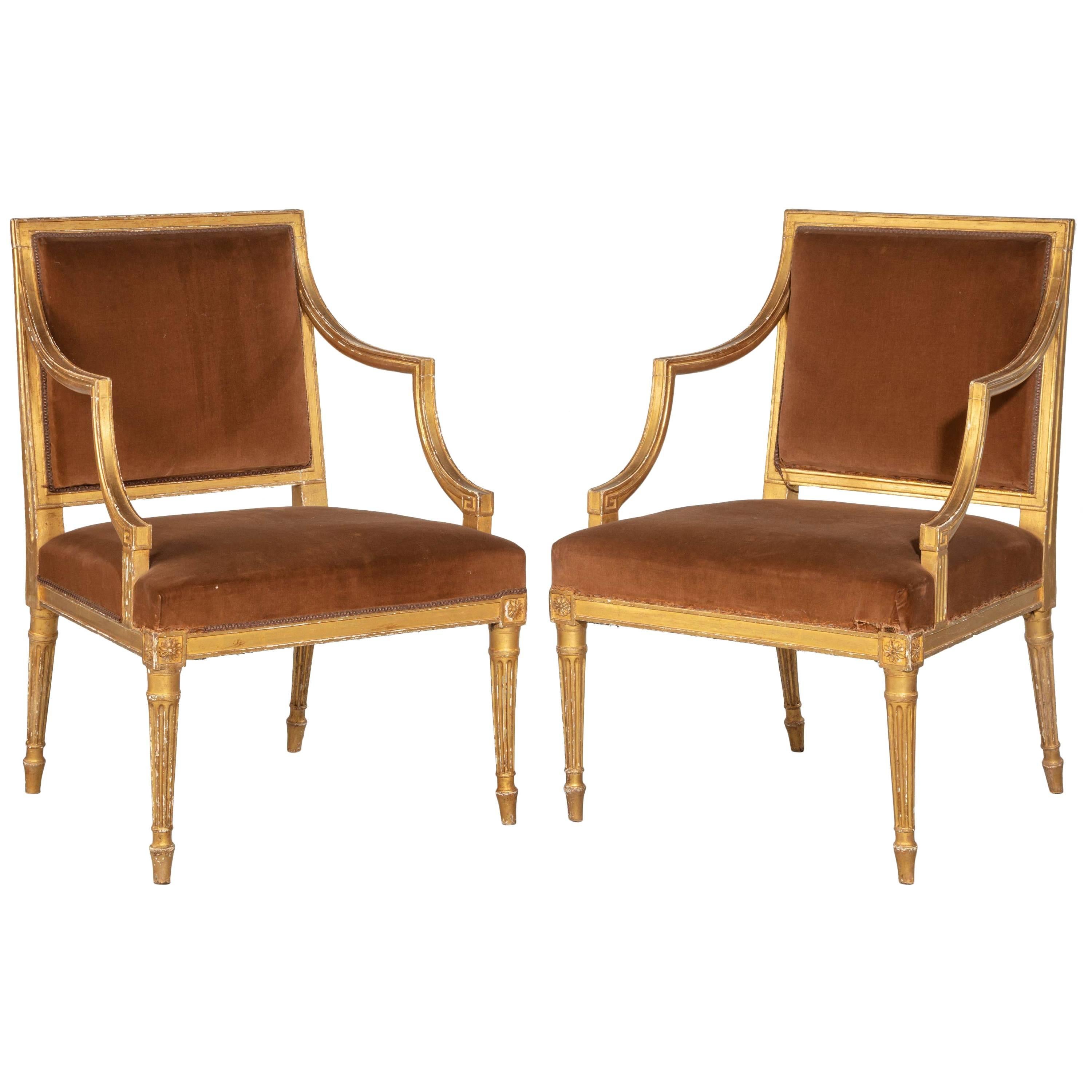 Pair of Chippendale Period Giltwood Elbow Chairs