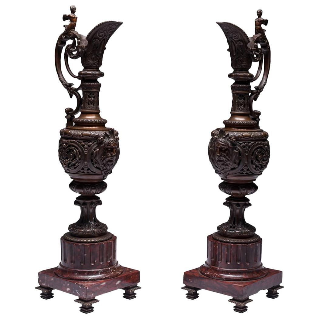 Pair of LARGE Rocaille Ewers in Bronze with Brown Patina on Red Marble Base For Sale
