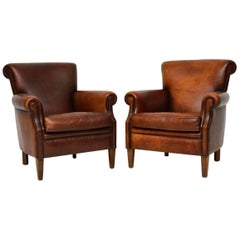 Pair of Antique Distressed Leather Armchairs