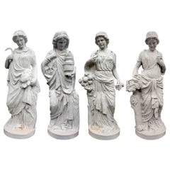 Cast Iron Set of Four Seasons Sculptures in White