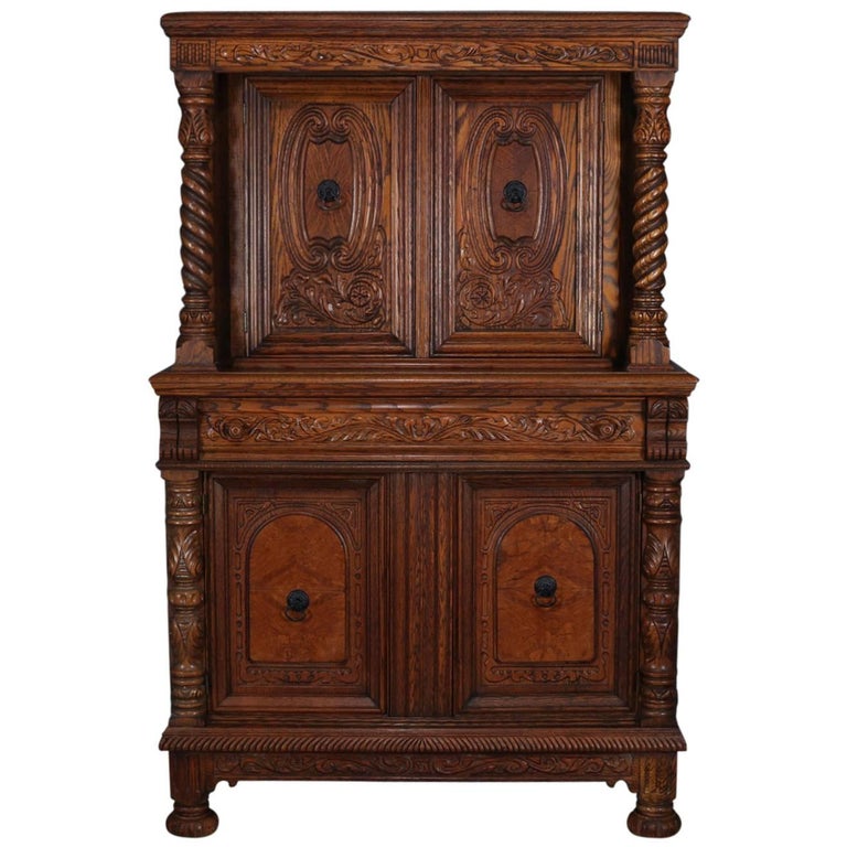 Antique Jacobean Heavily Carved Oak And Burl Step Back Cupboard Antique Jacobean Heavily Carved Oak and Burl Step Back Cupboard, circa 1930 For Sale - Antique Jacobean Heavily Carved Oak And Burl Step Back Cupboard