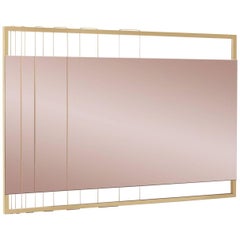 Pink Tinted Contemporary Mirror on a Gold Metal Frame with Brass Wire