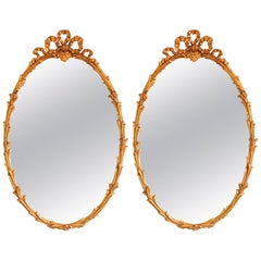 Rococo Style Oval Wall Mirrors in Giltwood Foliate Frame with Ribbon at the Top