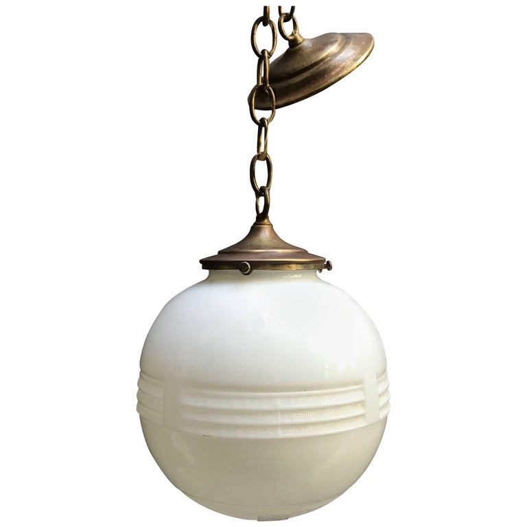 Art Deco Caged Milk Glass and Iron Pendant Light at 1stdibs