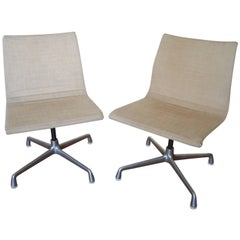 Pair of Eames Swivel Chairs