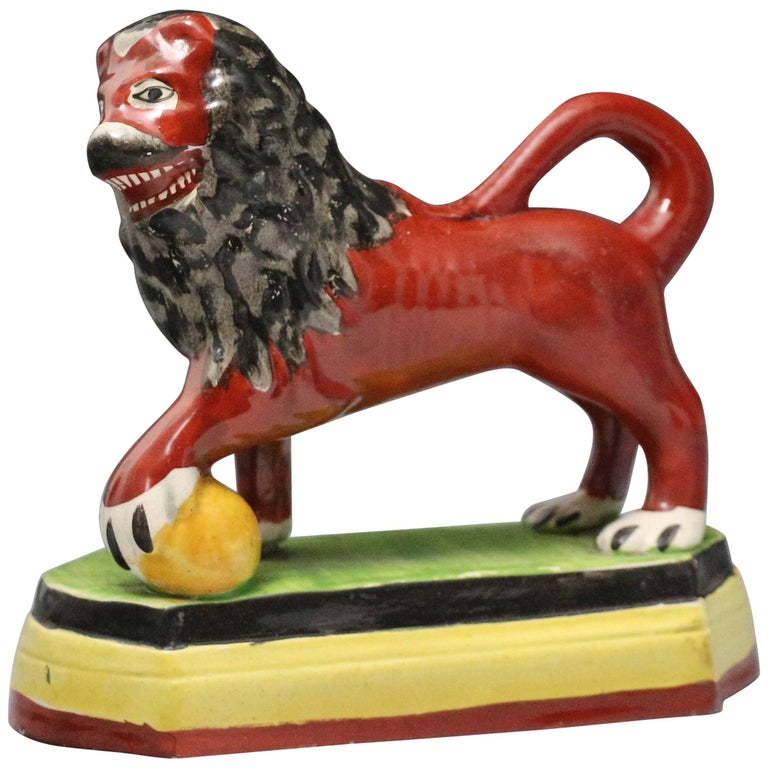 Antique English Bocage Figure Persuasion Staffordshire Pottery Early Staffordshire Pottery Figure Of A Lion With Paw On Ball Early 19th Century