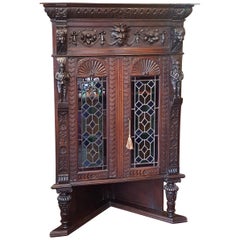 Late 19th Century Flemish Carved Oak Corner Cabinet