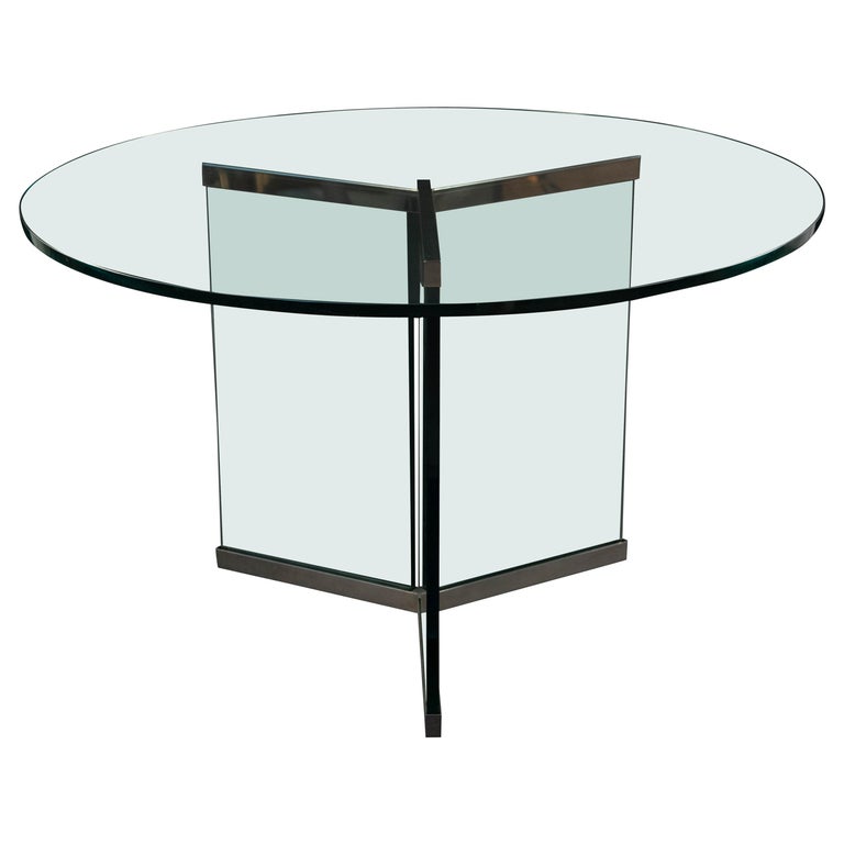 Round glass dining table by LEON ROSEN for PACE COLLECTION at 1stdibs