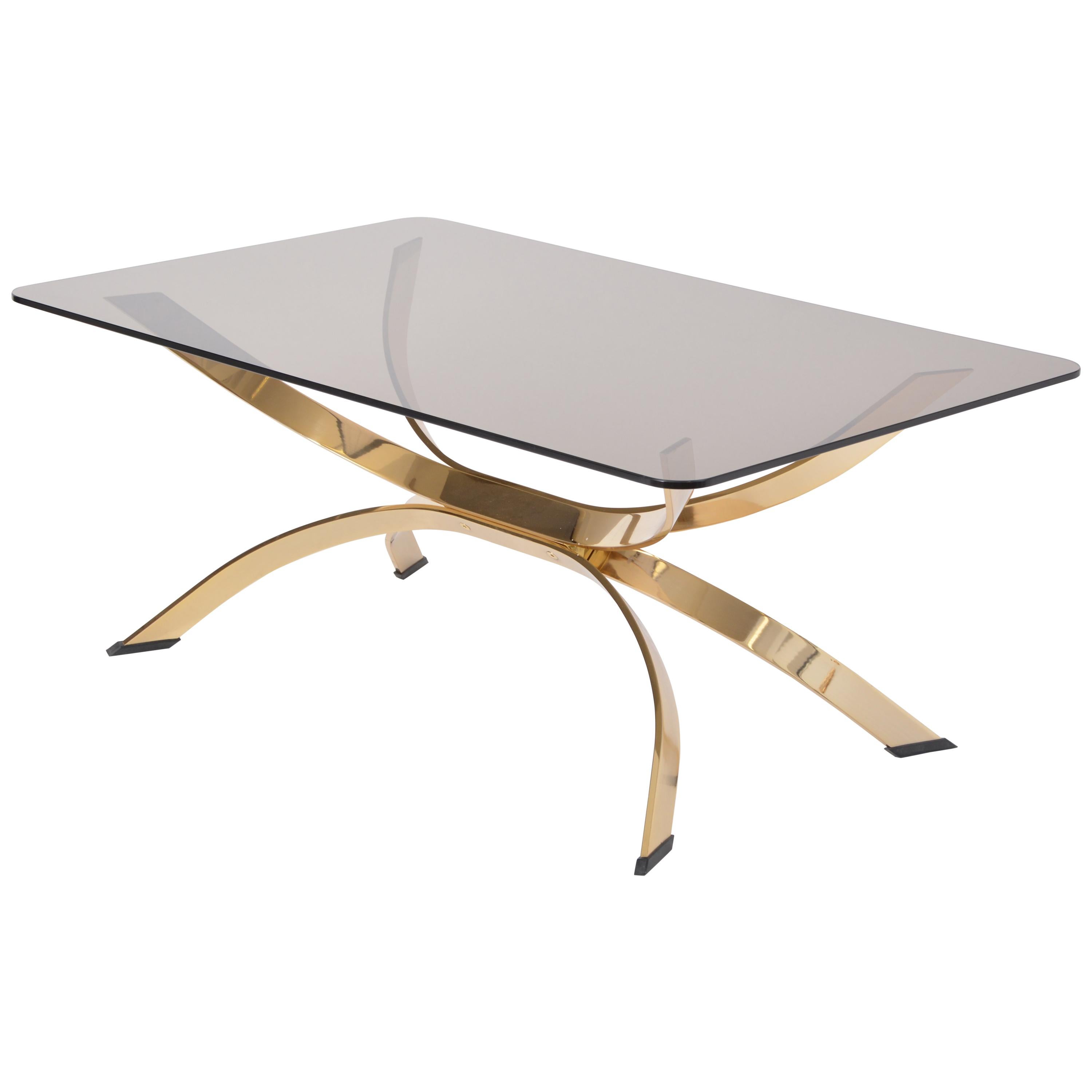 Gold Colored Mid-Century Modern coffee table with smoked Glass top