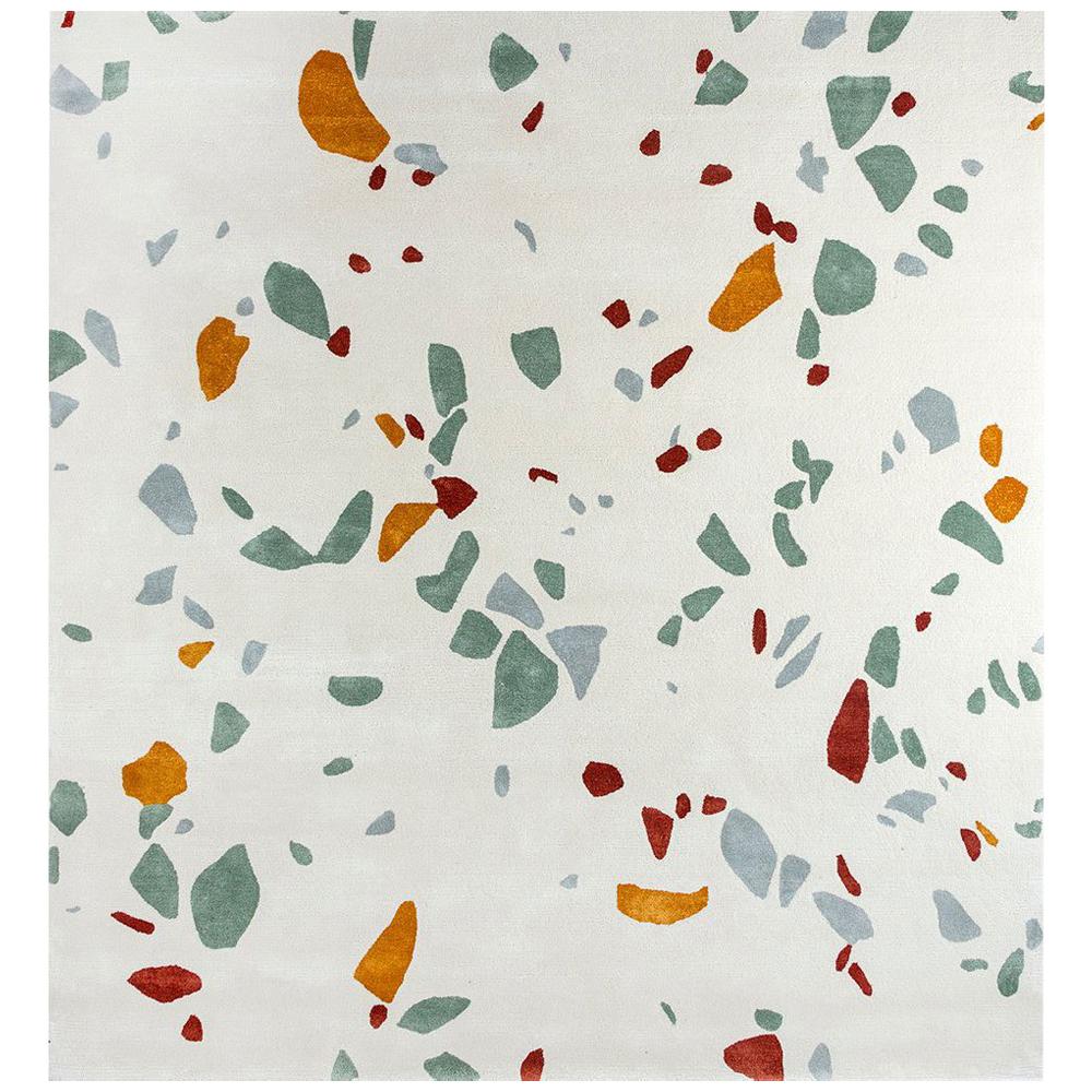 Hasa (originally meaning pebble in Arabic) is inspired by the Grimms fairy tale of Hansel and Gretel. Four different colors are spread on beige base carpet resembling colorful terrazzo mosaics. This wool and viscose mix rug is produced by Stepevi