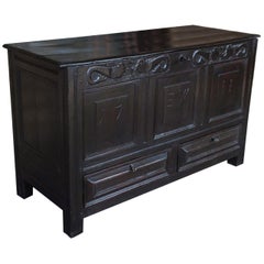 18th Century Black Oak Renaissance Coffer with Carved Fish Decoration