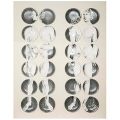 Set of Piero Fornasetti "Adam" and "Eve" Plates. Milan, Italy, circa 1960