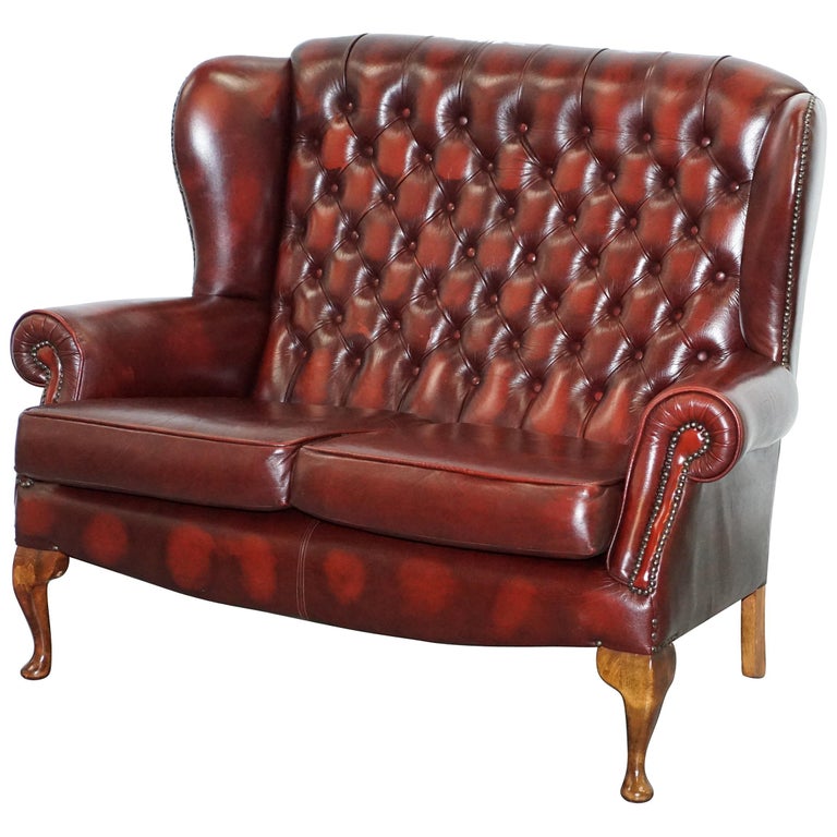 Vintage Chesterfield Oxblood Leather Two Seat Wingback Sofa Vintage Chesterfield Oxblood Leather Two Seat Wingback Sofa Settee For