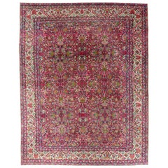 Antiker persischer Lavar Kerman-Teppich in Magenta mit floralem All-Over-Muster