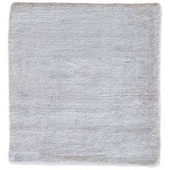 Tappeto bianco di seta di bambù intrecciato a mano con texture di lusso e finitura liscia e morbida