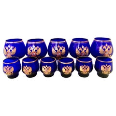 Midcentury Cobalt and 22K Gold Coat of Arms Bohemia Glass Drinks Set of 11