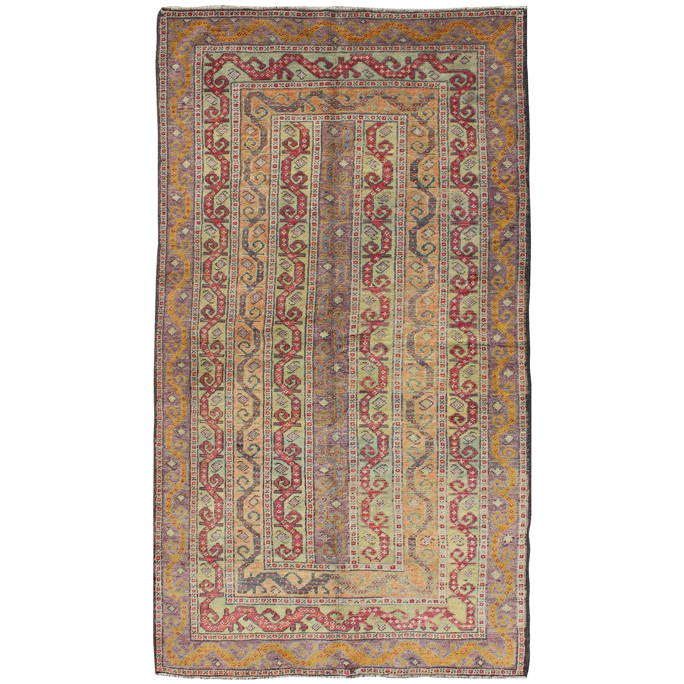 Vintage Turkish Rug with a All-Over Modern Design in Green, Red and Purple For Sale