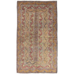 Vintage Turkish Rug with a All-Over Modern Design in Green, Red and Purple